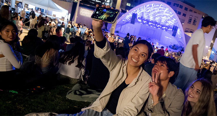 Asian American and Pacific Islander students celebrate together at a concert on the UC San Diego campus