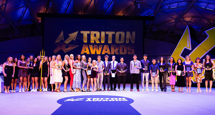 Large group of Triton scholar-athletes on stage at the 2024