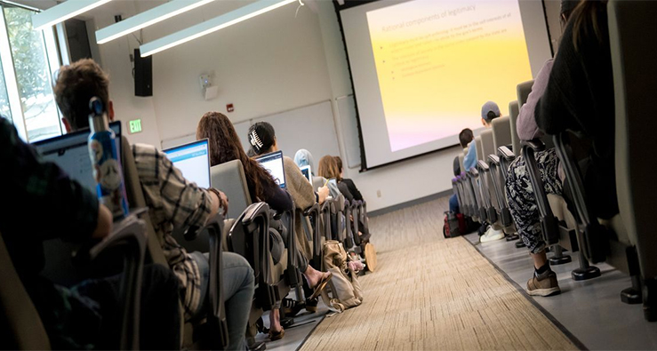 Classroom full of students on their laptops