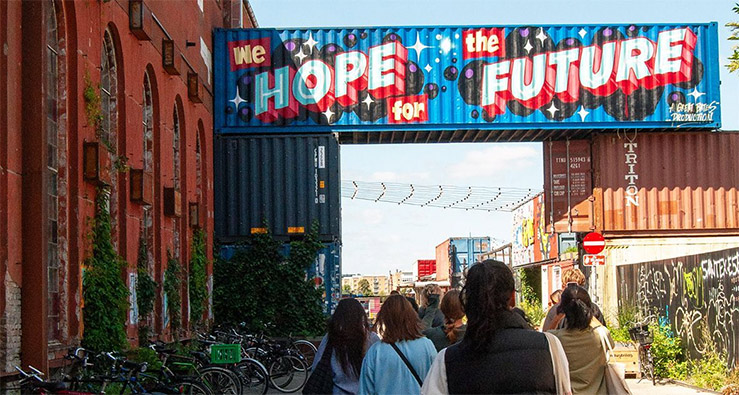 Colorful urban street scene with cool hand-lettered mural in Copenhagen, Denmark