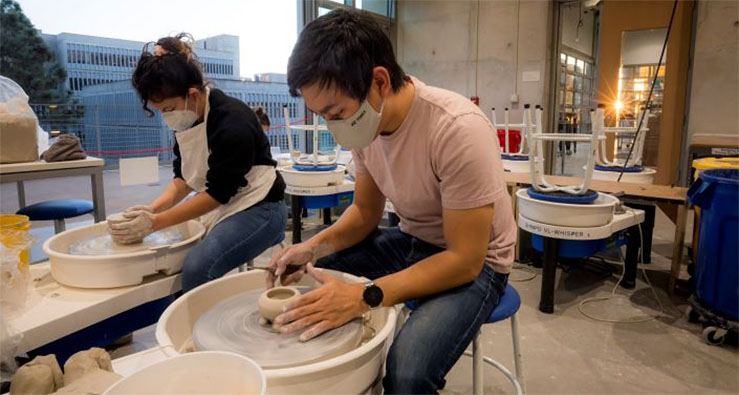 photos of UC San Diego students sitting at ceramics wheels at the new Craft Center on campus
