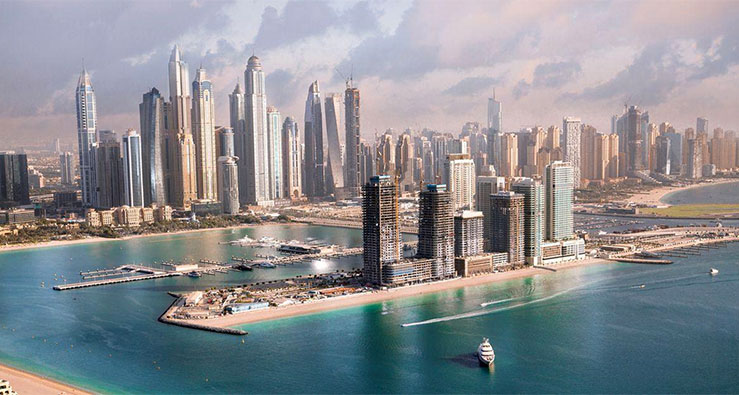 An aerial photo Dubai, its towering skyscrapers and surrounding sea