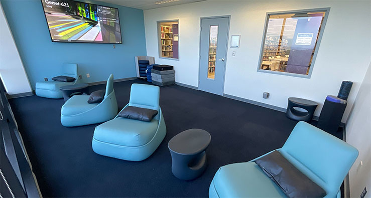 Interior study room at UCSD's Geisel Library, comfy modern chairs and chill vibe