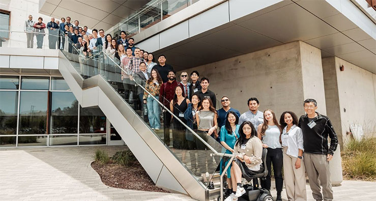Large group of student scientists gather on a long stairway - The Medical Scientist Training Program commemorated its 50th anniversary with a weekend full of celebrating including a gala and research symposium which was attended by current students, alumni and other supporters. Photos by Matthew Kim, MS2 in the MSTP