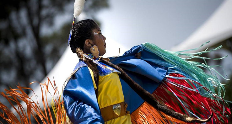 Native American dancer in colorful dress