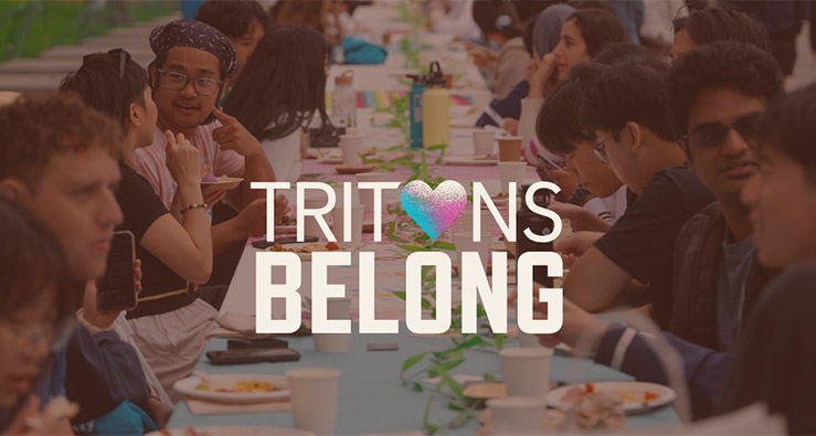 Tritons Belong large white text over a photo of multiple UCSD students seated at a long table