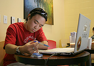 UCSD Student on a laptop